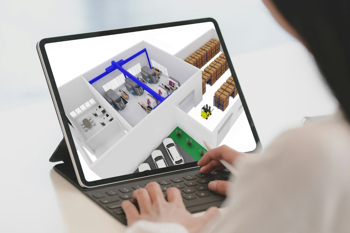 Digitale Fabrikplanung mit Maschinen, Lagerflächen und Materialfluss auf Tablet